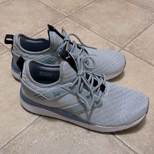Lightly used puma athletic shoes! Worn literally 3 times. No spots, holes, etc